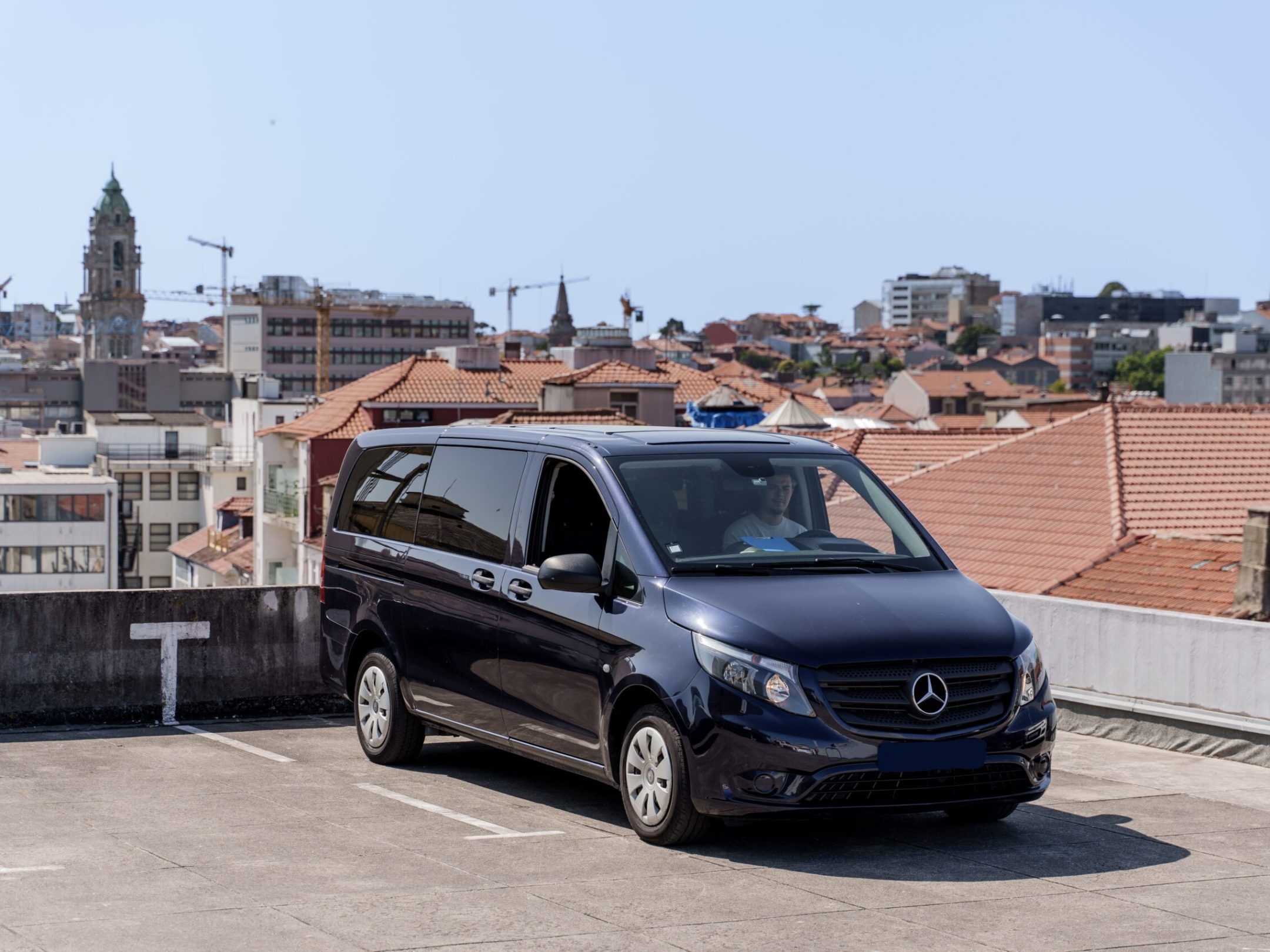 a car parked used to do trasnfer to porto city center