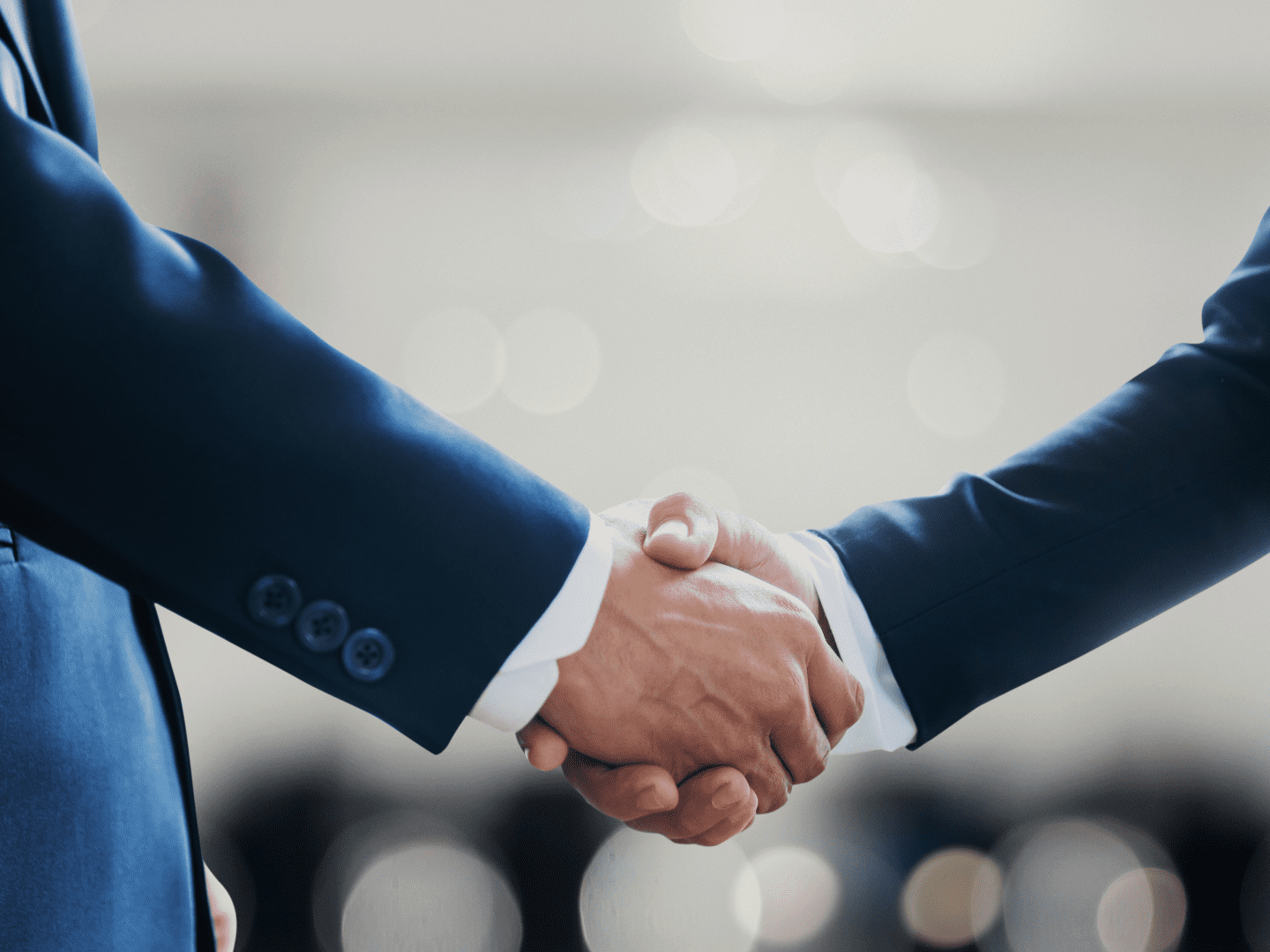 Business partners hand shaking