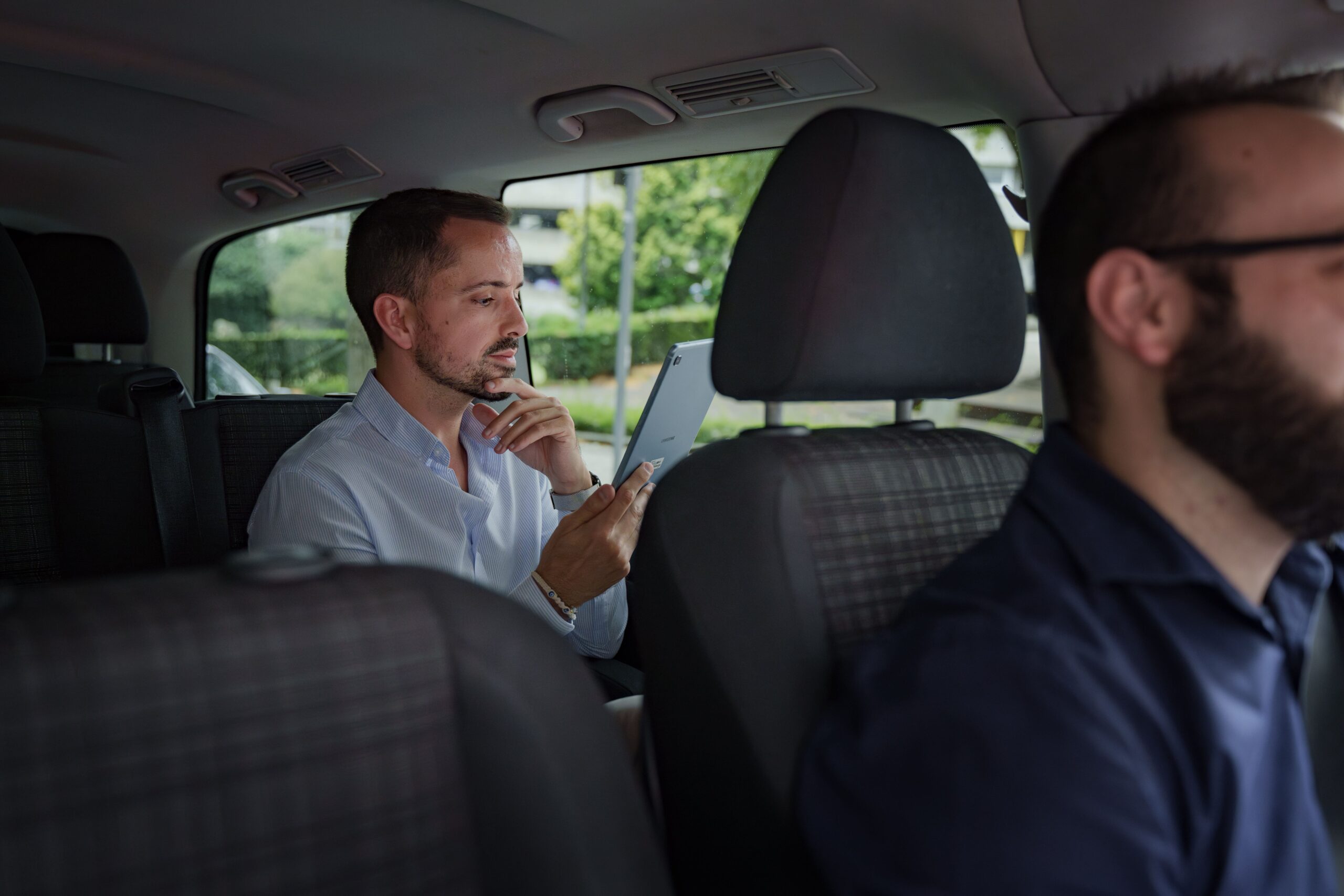 a man sitting in a car