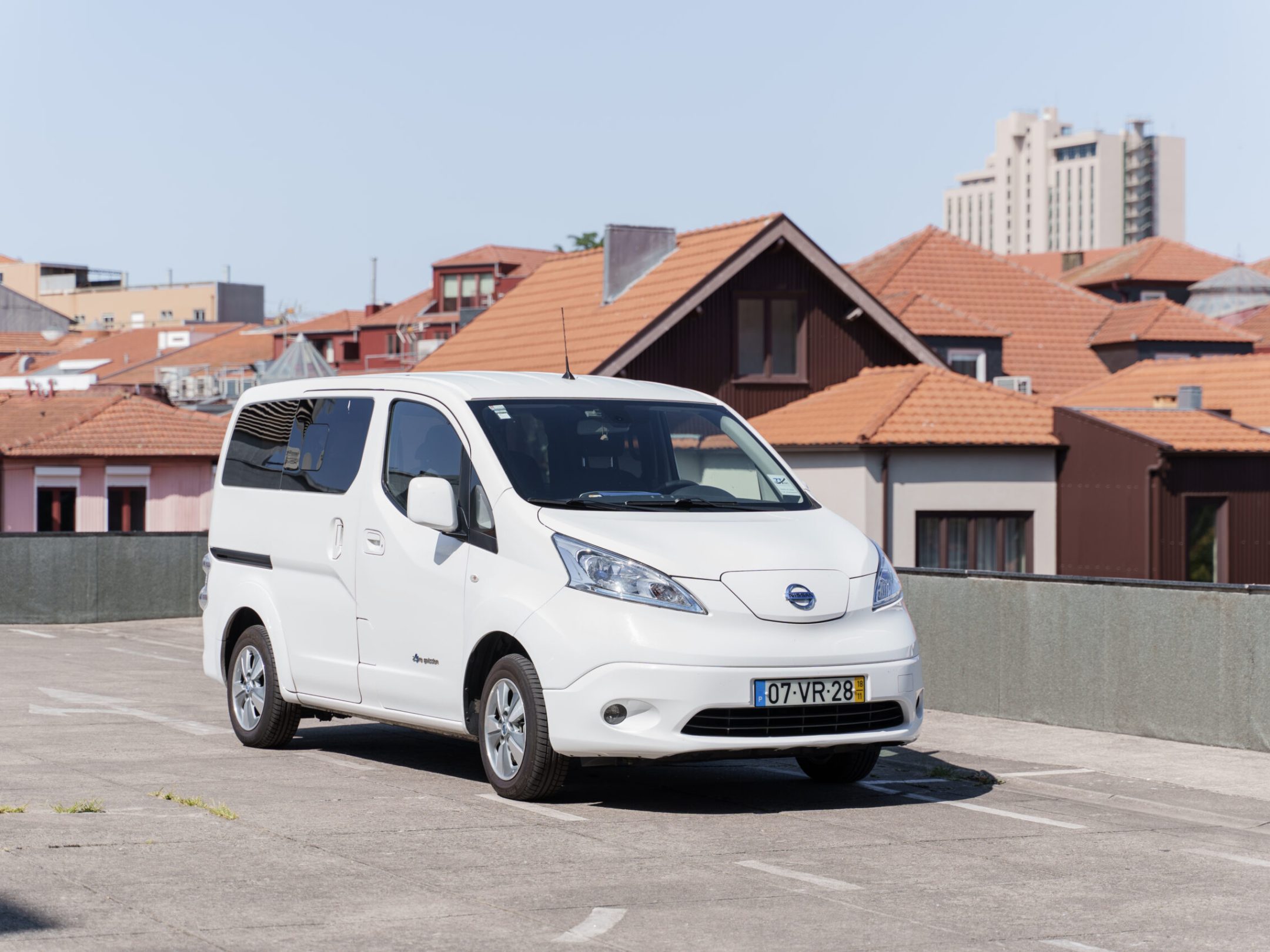 Eletric Van parked in front of a house