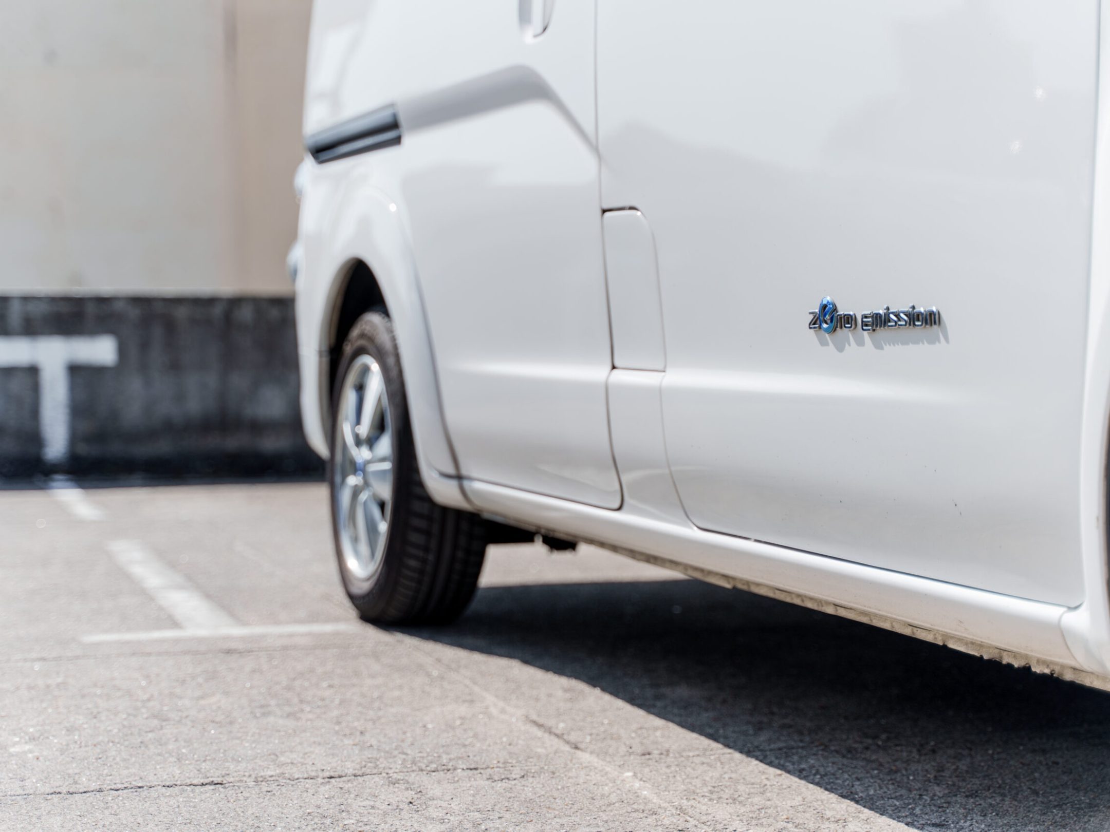 Eletric Van parked on the side of a road
