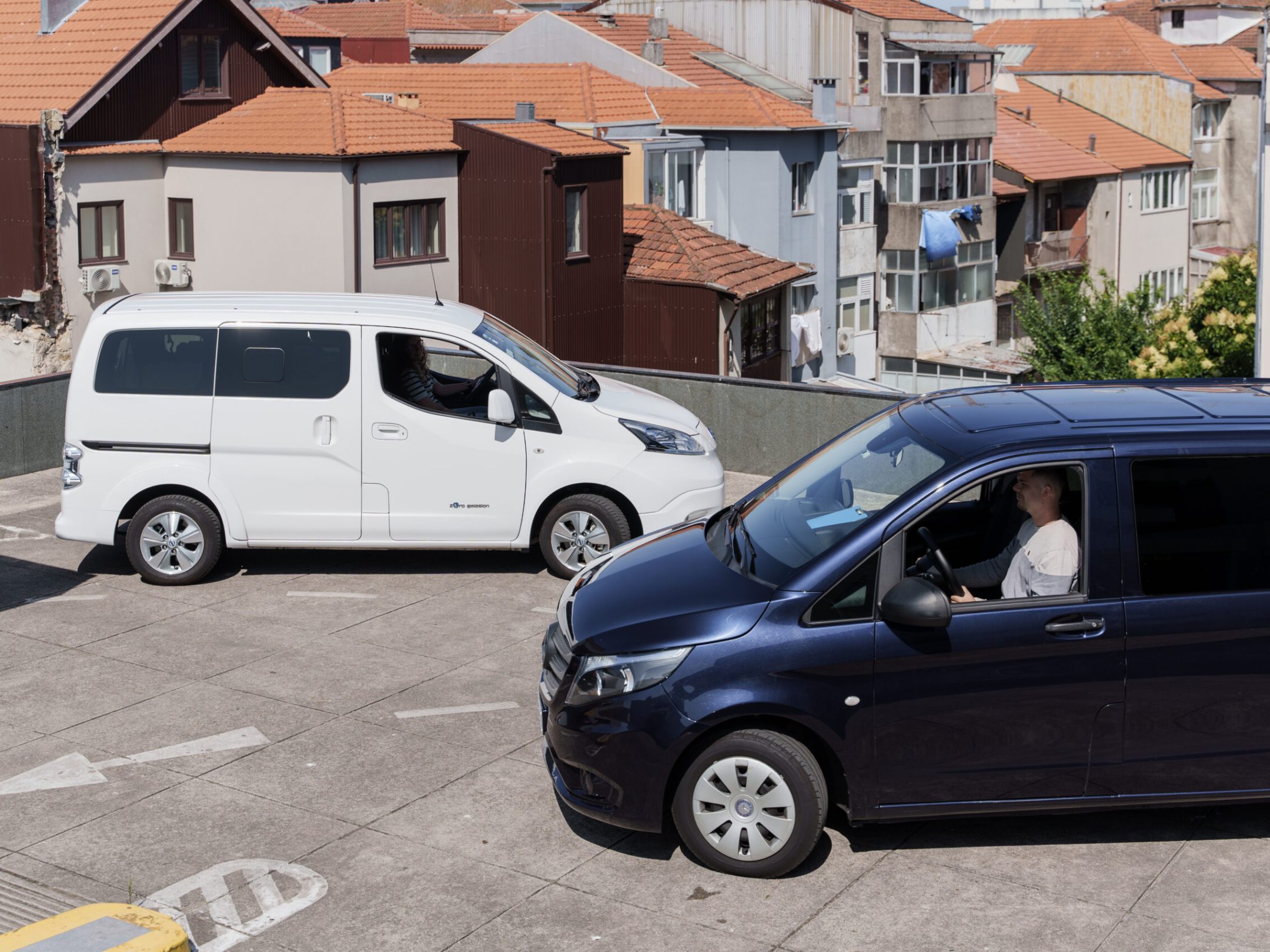 Two vans Parked waiting for tourists