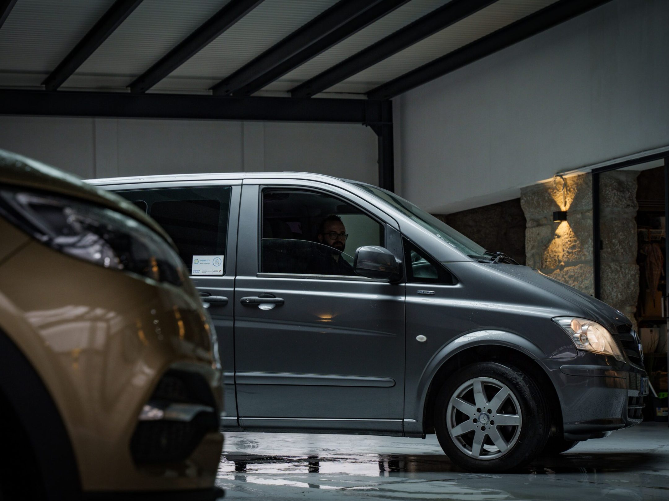 a car parked on the side of a building