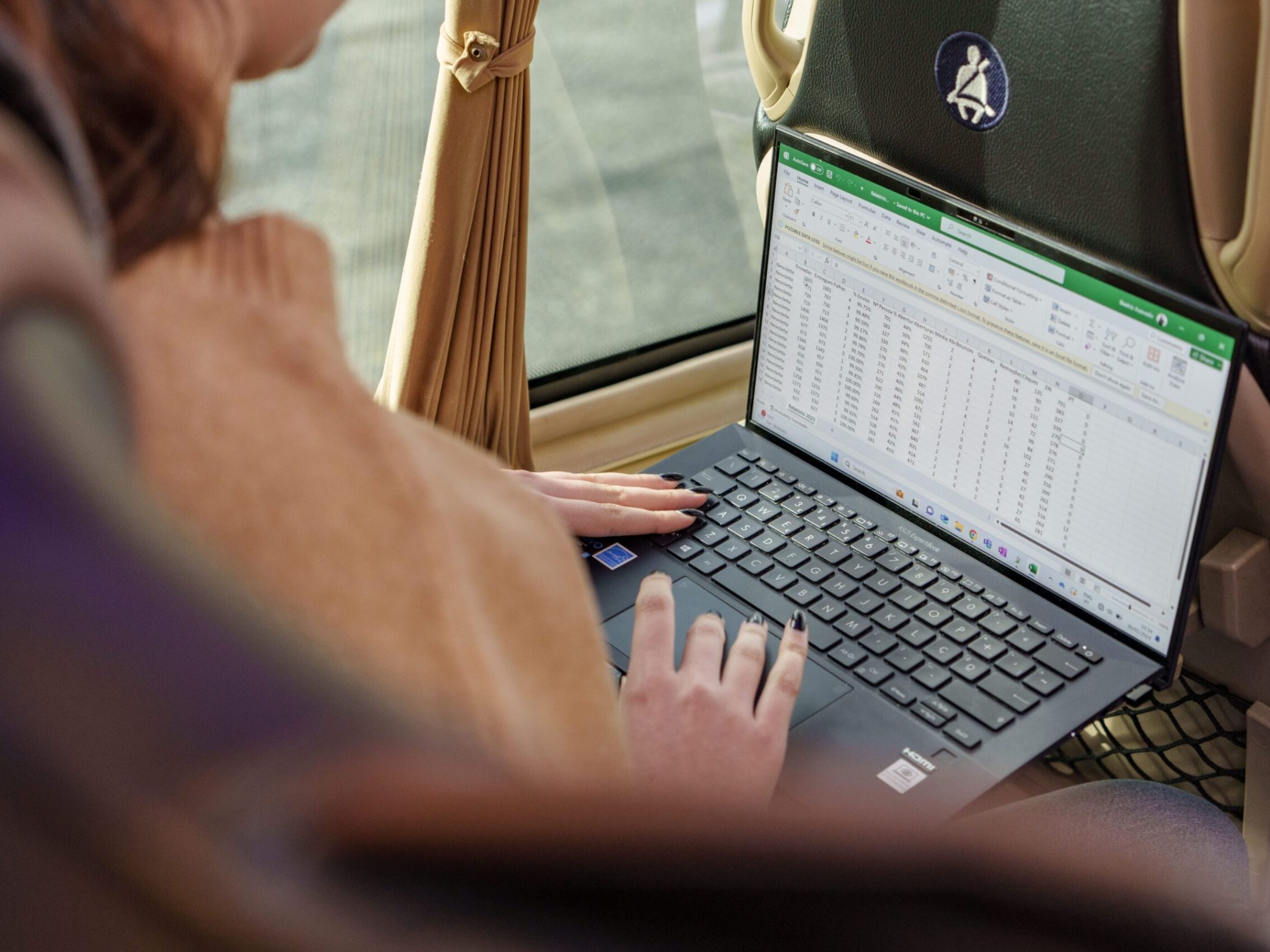 a person using a laptop computer