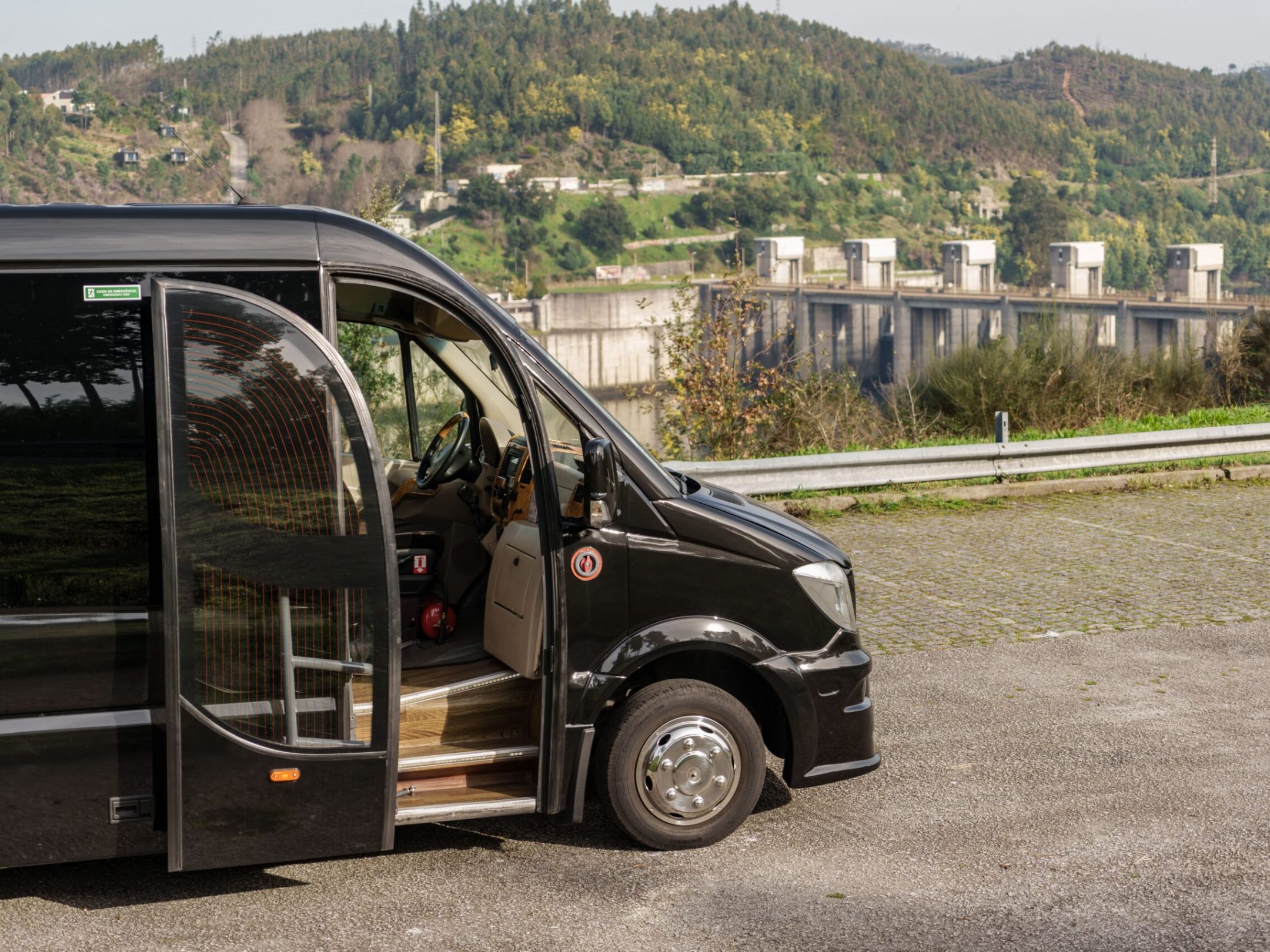 a car parked on the side of a mountain