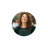 a person standing in front of a mirror posing for the camera