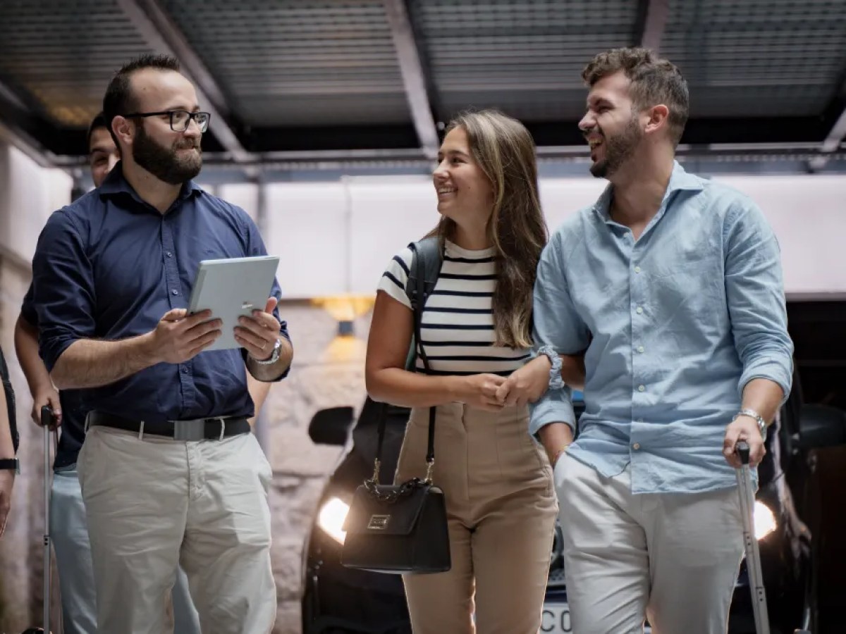 a group of people standing in a room